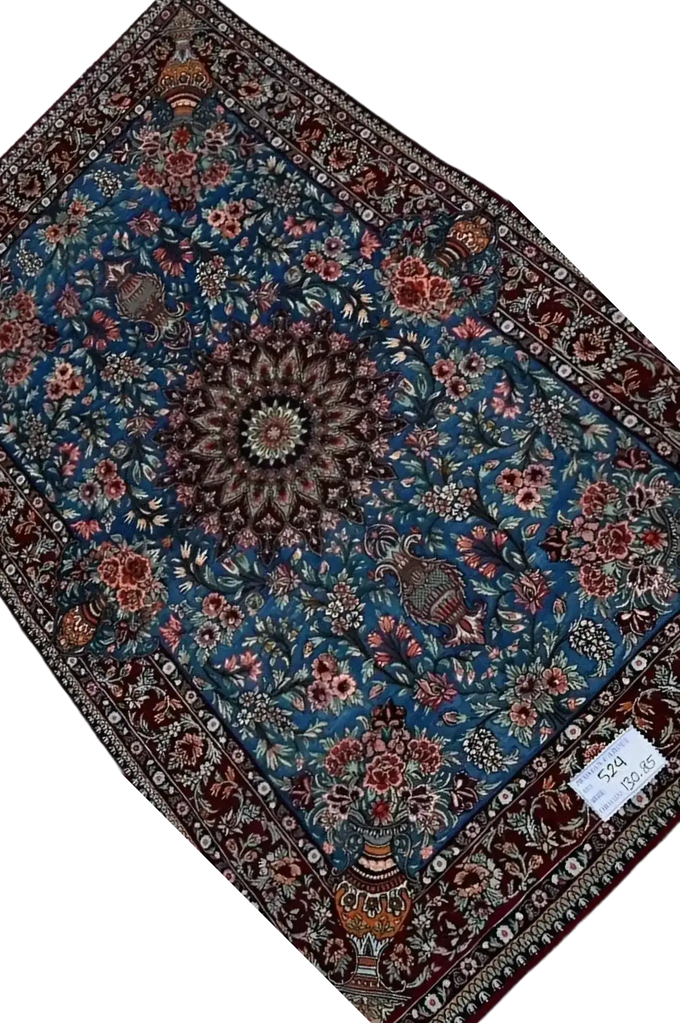 "Hand-knotted Persian Isfahan rug, made with a blend of wool and silk. The rug measures 130 cm x 85 cm (4.2 x 2.8 feet) with intricate detailing and a knot density of 810,000 knots per square meter. A luxurious piece designed for modern home decor with traditional Persian craftsmanship, featuring both elegance and durability."